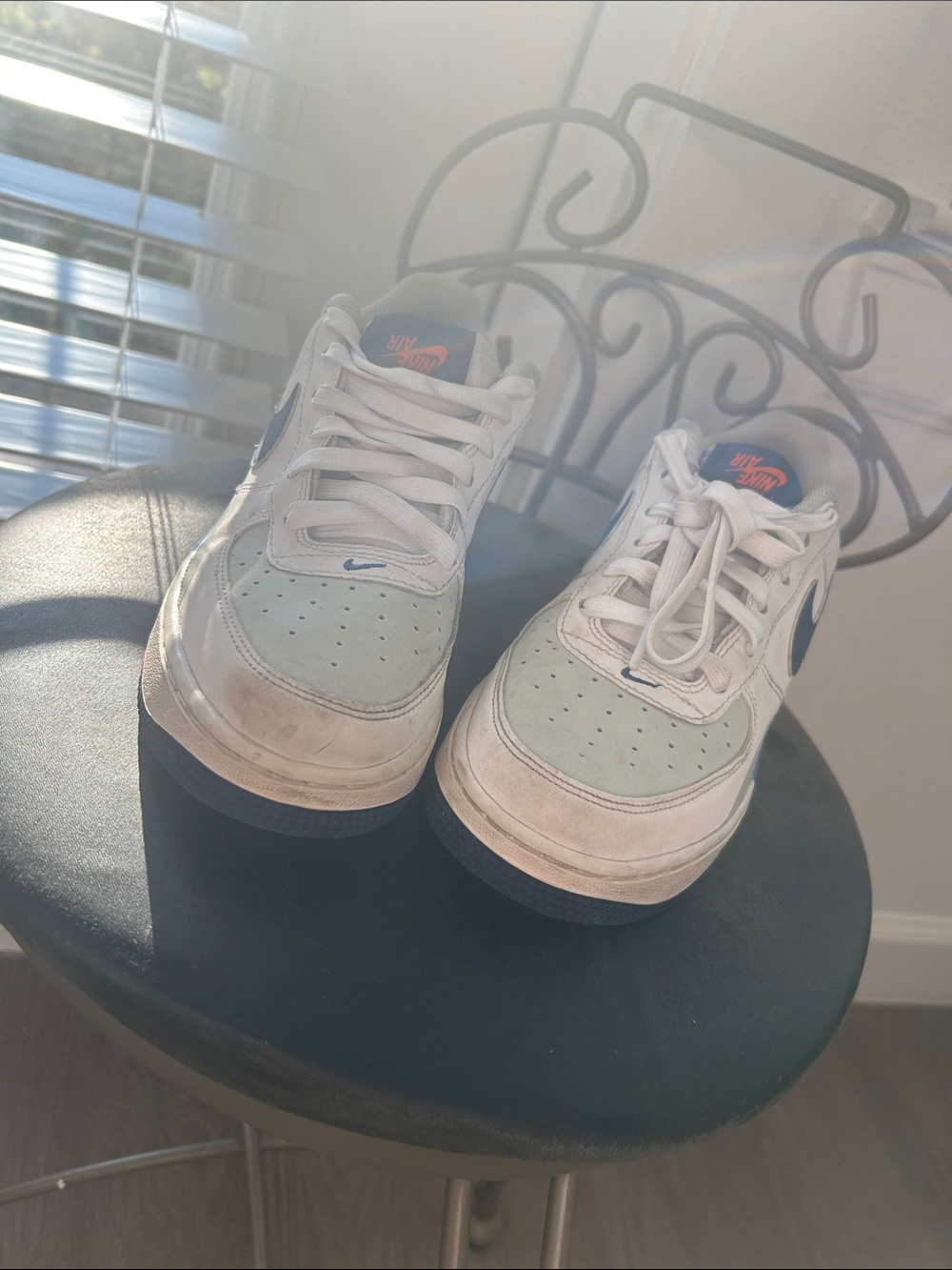 Nike Kids White Sneakers with Blue and Orange Accents